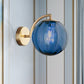 Postmodernist Brass Armed Ball Sconce Lamp Red/Blue/Amber Glass Single Light Wall Lighting Fixture Blue Clearhalo 'Cast Iron' 'Glass' 'Industrial' 'Modern wall lights' 'Modern' 'Tiffany' 'Traditional wall lights' 'Wall Lamps & Sconces' 'Wall Lights' Lighting' 240182