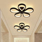 Black Flower Ceiling Flush Light Minimalistic Metal LED Semi Mount Lighting for Corridor 5 Black Clearhalo 'Ceiling Lights' 'Close To Ceiling Lights' 'Close to ceiling' 'Semi-flushmount' Lighting' 2406169