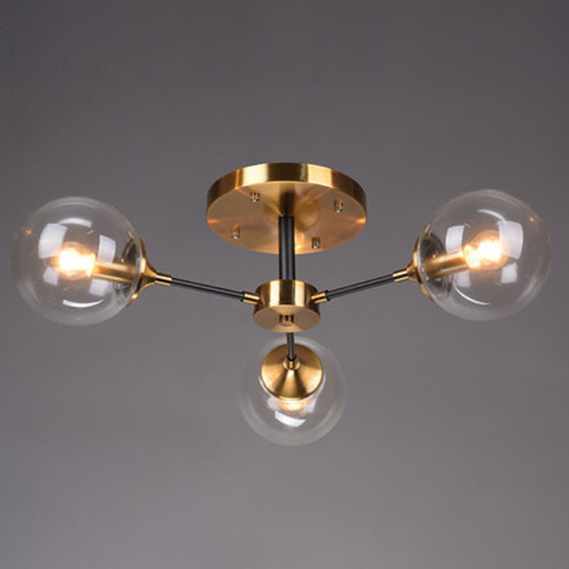 Brass Finish Radial Ceiling Lamp Postmodern Metal Semi Mount Lighting with Ball Glass Shade 3 Clear Clearhalo 'Ceiling Lights' 'Close To Ceiling Lights' 'Close to ceiling' 'Semi-flushmount' Lighting' 2408715