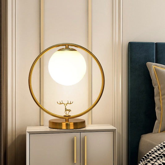 Ivory Glass Ball Table Light Simple Style 1-Light Gold Night Lamp with Metal Ring and Deer Deco Clearhalo 'Lamps' 'Table Lamps' Lighting' 2408774