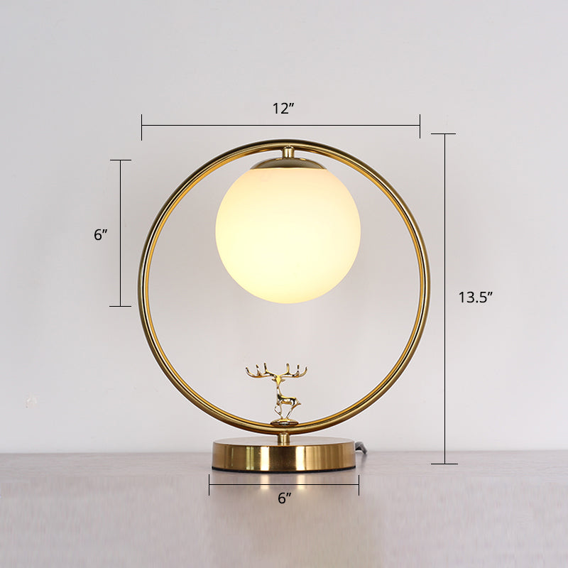 Ivory Glass Ball Table Light Simple Style 1-Light Gold Night Lamp with Metal Ring and Deer Deco Clearhalo 'Lamps' 'Table Lamps' Lighting' 2408777