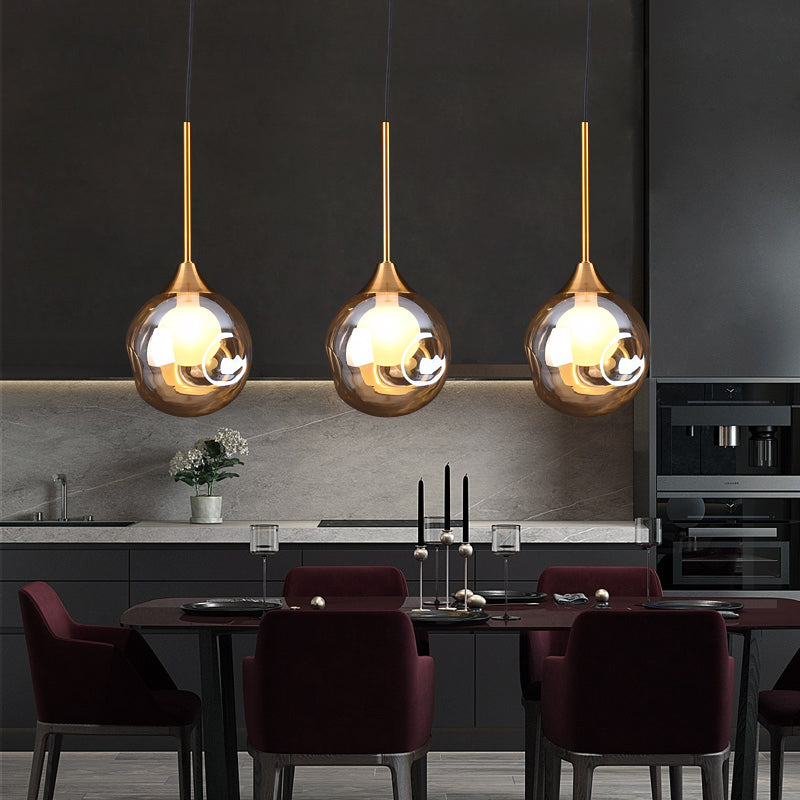 Ball Down Lighting Pendant Minimalism Glass 3-Head Dining Room Multiple Hanging Light Clearhalo 'Ceiling Lights' 'Modern Pendants' 'Modern' 'Pendant Lights' 'Pendants' Lighting' 2408788