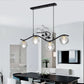 Metal Wavy Island Pendant Minimalist 4-Light Black Hanging Lamp with Ball Glass Shade and Bird Deco Clearhalo 'Ceiling Lights' 'Island Lights' Lighting' 2408802