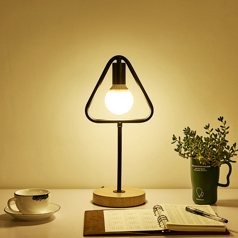Geometric Frame Metal Table Lamp Industrial Single Bedside Night Light with Round Wooden Base Black Triangle Clearhalo 'Lamps' 'Table Lamps' Lighting' 2409107