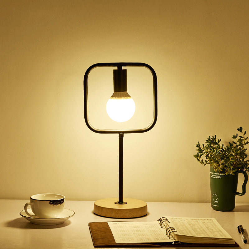 Geometric Frame Metal Table Lamp Industrial Single Bedside Night Light with Round Wooden Base Black Square Plate Clearhalo 'Lamps' 'Table Lamps' Lighting' 2409108
