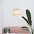 Globe Hanging Ceiling Lantern Minimalist Feather 3-Bulb White Pendant Light for Bedroom White Clearhalo 'Ceiling Lights' 'Modern Pendants' 'Modern' 'Pendant Lights' 'Pendants' Lighting' 2415893