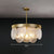 Postmodern Disc Pendant Light Seeded Glass 3-Light Living Room Chandelier in Brass Brass Clearhalo 'Ceiling Lights' 'Chandeliers' 'Modern Chandeliers' 'Modern' Lighting' 2424443