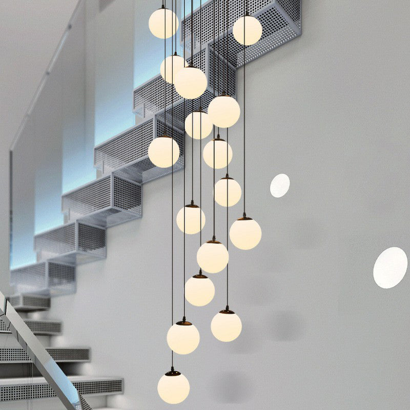Black Globe Pendant Light Fixture Simple Cream Glass Multiple Hanging Light for Stairs Clearhalo 'Ceiling Lights' 'Modern Pendants' 'Modern' 'Pendant Lights' 'Pendants' Lighting' 2424518