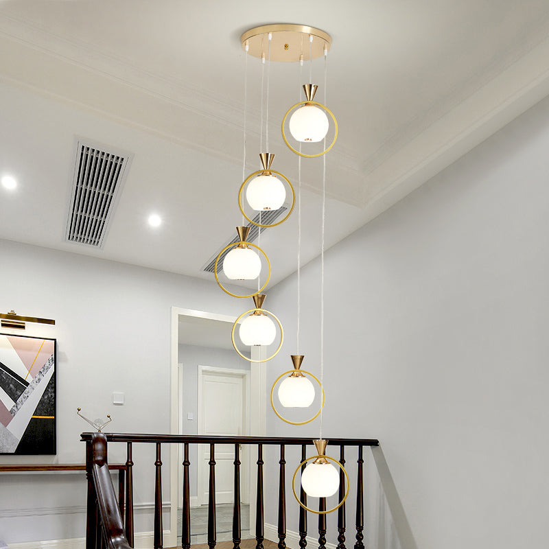 Ball Shaped Suspension Light Simplicity White Glass 6-Light Stairs Multi Pendant with Metal Loop in Gold Gold Clearhalo 'Ceiling Lights' 'Modern Pendants' 'Modern' 'Pendant Lights' 'Pendants' Lighting' 2424527