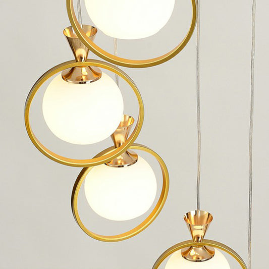 Ball Shaped Suspension Light Simplicity White Glass 6-Light Stairs Multi Pendant with Metal Loop in Gold Clearhalo 'Ceiling Lights' 'Modern Pendants' 'Modern' 'Pendant Lights' 'Pendants' Lighting' 2424531