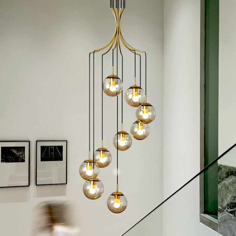 Cognac Glass Ball Pendant Lighting Postmodern Gold Multi Hanging Light Fixture for Villa 9 Cognac Clearhalo 'Ceiling Lights' 'Modern Pendants' 'Modern' 'Pendant Lights' 'Pendants' Lighting' 2424564