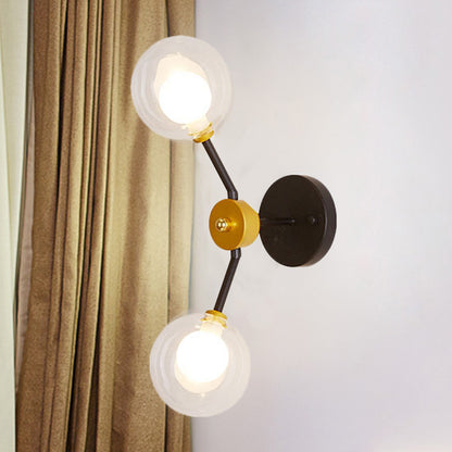 2 Lights Bedroom Sconce Light with Global Clear Glass Shade Modern Black Led Wall Mount Light Black Clearhalo 'Cast Iron' 'Glass' 'Industrial' 'Modern wall lights' 'Modern' 'Tiffany' 'Traditional wall lights' 'Wall Lamps & Sconces' 'Wall Lights' Lighting' 242979