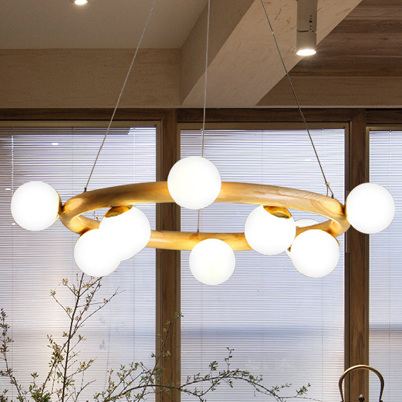 Wood Ring Suspension Light with Bubble Shade Japanese Style Pendant Light in Beige for Study Room 10 Wood Clearhalo 'Carpenter Chandeliers' 'Ceiling Lights' 'Chandeliers' 'Industrial' 'Modern Chandeliers' 'Modern' Lighting' 243107
