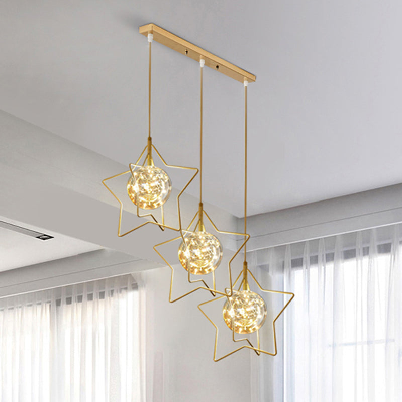 Gold Star and Ball Cluster Pendant Designer 3 Heads Clear Glass LED Hanging Light for Restaurant Clearhalo 'Ceiling Lights' 'Modern Pendants' 'Modern' 'Pendant Lights' 'Pendants' Lighting' 2460077
