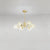 Dimpled Blown Glass Cup Chandelier Postmodern Gold Finish Hanging Lamp for Living Room 6 Gold Clearhalo 'Ceiling Lights' 'Chandeliers' 'Close To Ceiling Lights' 'Glass shade' 'Glass' 'Modern Chandeliers' 'Modern' Lighting' 2460732