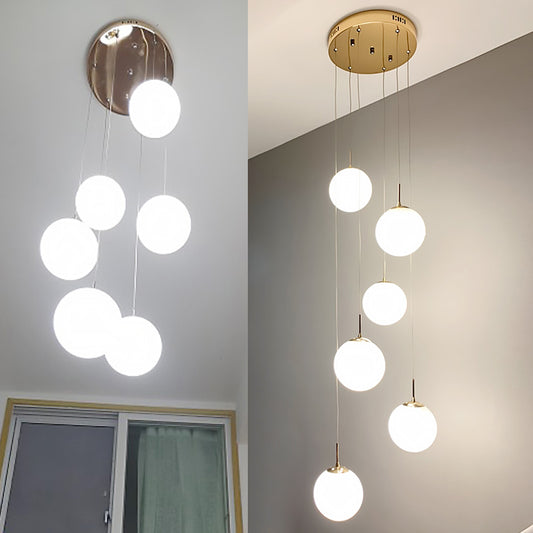 Cream Glass Bubbles Multi Pendant Ceiling Light Minimalism White Glass Staircase Suspension Light in Gold 6 Gold Clearhalo 'Ceiling Lights' 'Modern Pendants' 'Modern' 'Pendant Lights' 'Pendants' Lighting' 2461330