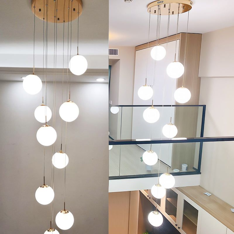 Cream Glass Bubbles Multi Pendant Ceiling Light Minimalism White Glass Staircase Suspension Light in Gold Clearhalo 'Ceiling Lights' 'Modern Pendants' 'Modern' 'Pendant Lights' 'Pendants' Lighting' 2461336