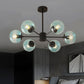 Amber/Blue/Clear Glass Spherical Chandelier Light Post Modern 6/8/10 Lights Black Pendant Lamp for Bedroom Clearhalo 'Ceiling Lights' 'Chandeliers' 'Clear' 'Glass shade' 'Glass' 'Industrial' 'Modern Chandeliers' 'Modern' 'Tiffany' 'Traditional Chandeliers' Lighting' 246140