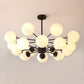 Amber/Blue/Clear Glass Spherical Chandelier Light Post Modern 6/8/10 Lights Black Pendant Lamp for Bedroom 16 White Clearhalo 'Ceiling Lights' 'Chandeliers' 'Clear' 'Glass shade' 'Glass' 'Industrial' 'Modern Chandeliers' 'Modern' 'Tiffany' 'Traditional Chandeliers' Lighting' 246164