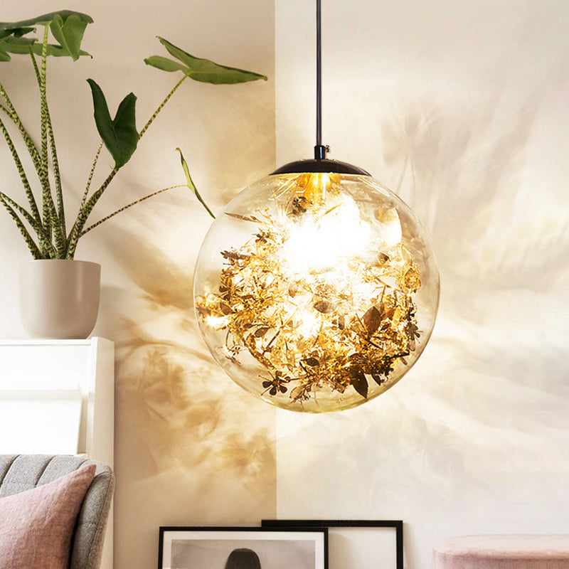 Globe Suspension Lighting Simple Clear Glass 1-Head Dining Room Pendant Light with Foil Flower Inside Gold Clearhalo 'Ceiling Lights' 'Close To Ceiling Lights' 'Glass shade' 'Glass' 'Modern Pendants' 'Modern' 'Pendant Lights' 'Pendants' Lighting' 2461758