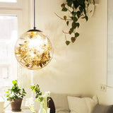 Globe Suspension Lighting Simple Clear Glass 1-Head Dining Room Pendant Light with Foil Flower Inside Clearhalo 'Ceiling Lights' 'Close To Ceiling Lights' 'Glass shade' 'Glass' 'Modern Pendants' 'Modern' 'Pendant Lights' 'Pendants' Lighting' 2461759