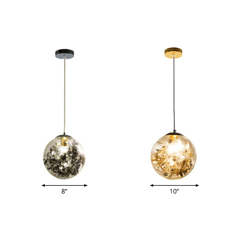 Globe Suspension Lighting Simple Clear Glass 1-Head Dining Room Pendant Light with Foil Flower Inside Clearhalo 'Ceiling Lights' 'Close To Ceiling Lights' 'Glass shade' 'Glass' 'Modern Pendants' 'Modern' 'Pendant Lights' 'Pendants' Lighting' 2461760
