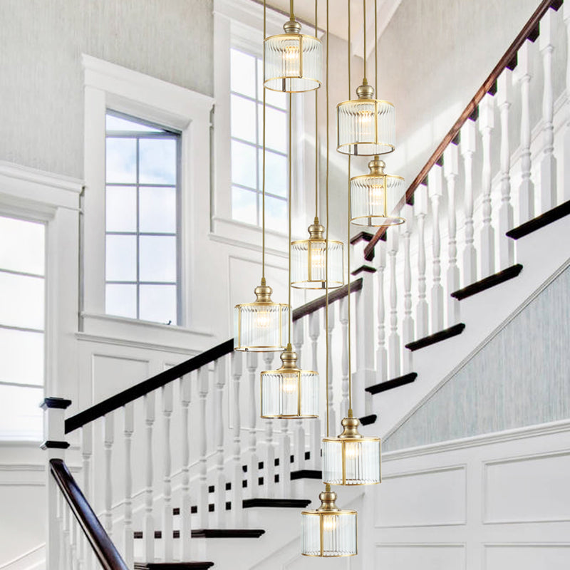 Brass Finish Cylinder Multiple Lamp Pendant Postmodern Ribbed Glass Hanging Light Fixture for Stairway 8 Brass Clearhalo 'Ceiling Lights' 'Modern Pendants' 'Modern' 'Pendant Lights' 'Pendants' Lighting' 2461947