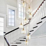 Brass Finish Cylinder Multiple Lamp Pendant Postmodern Ribbed Glass Hanging Light Fixture for Stairway 8 Brass Clearhalo 'Ceiling Lights' 'Modern Pendants' 'Modern' 'Pendant Lights' 'Pendants' Lighting' 2461947