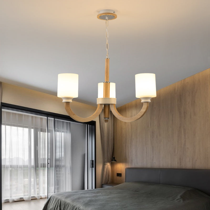 Wooden Arc Arm Up Chandelier Minimalist Brown Hanging Light with Cylindrical White Glass Shade Clearhalo 'Carpenter Chandeliers' 'Ceiling Lights' 'Chandeliers' 'Industrial' 'Modern Chandeliers' 'Modern' Lighting' 2462265