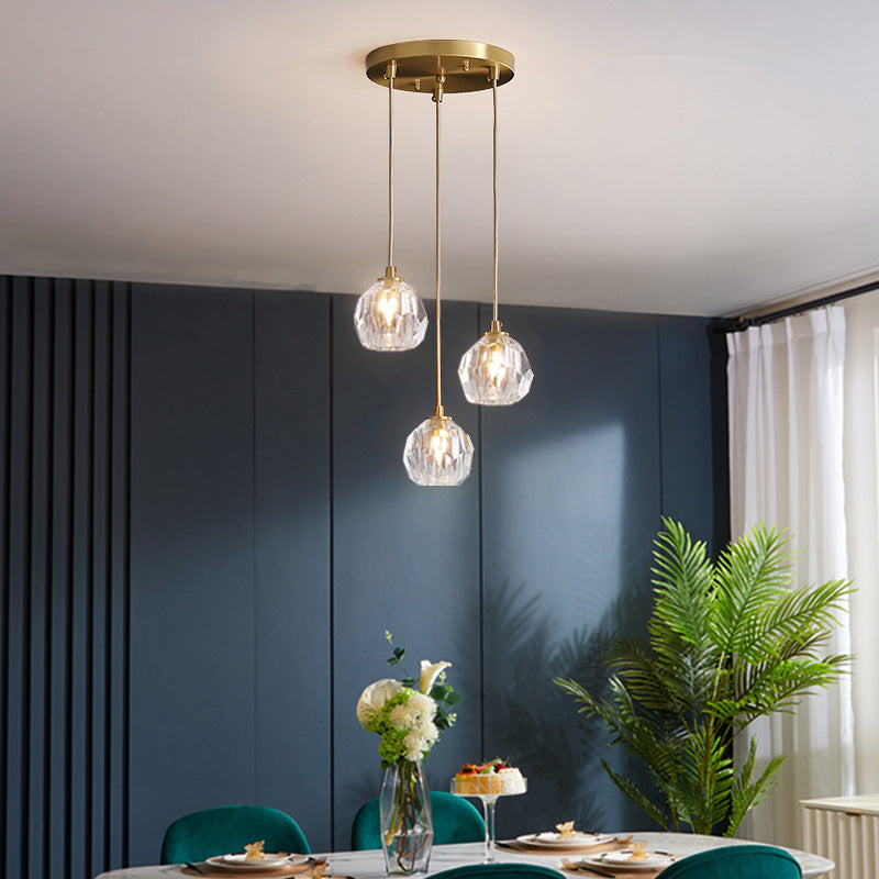 Ball Beveled K9 Crystal Suspension Lamp Simplicity Brass Finish Multi Pendant Ceiling Light 3 Brass Clearhalo 'Ceiling Lights' 'Modern Pendants' 'Modern' 'Pendant Lights' 'Pendants' Lighting' 2462460