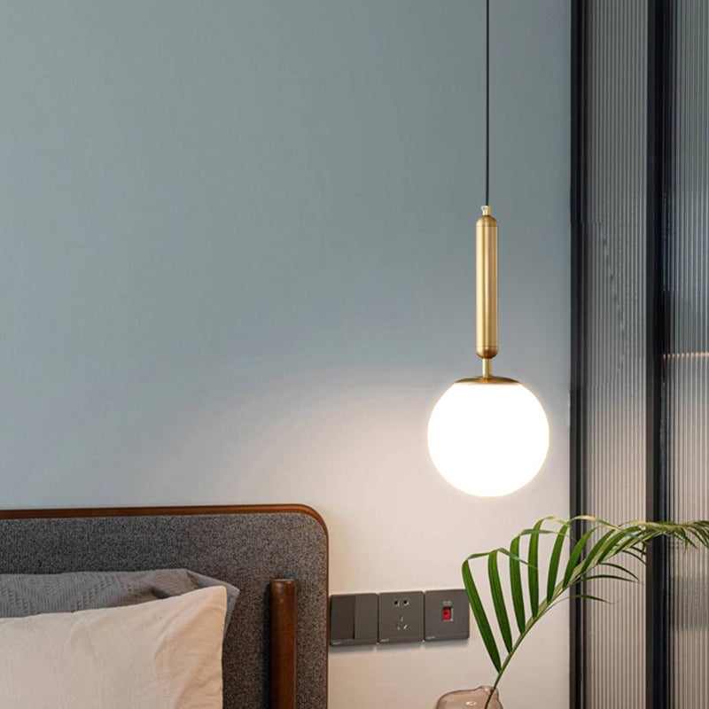 Minimalist Ball Hanging Ceiling Light Opal Blown Glass 1 Bulb Bedside Pendulum Light in Gold Gold Clearhalo 'Ceiling Lights' 'Chandeliers' 'Glass shade' 'Glass' 'Modern Pendants' 'Modern' 'Pendant Lights' 'Pendants' Lighting' 2462549