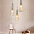 Conical Glass Multi-Light Pendant Modernist 3-Head Hanging Ceiling Light for Dining Room Cognac Round Clearhalo 'Ceiling Lights' 'Chandeliers' 'Glass shade' 'Glass' 'Modern Pendants' 'Modern' 'Pendant Lights' 'Pendants' Lighting' 2462671