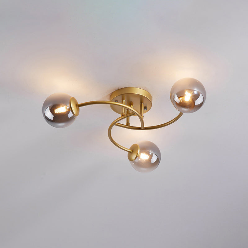 Swirled Metal Semi Flush Light Post-Modern Close to Ceiling Light with Ball Glass Shade 3 Gold Smoke Grey Clearhalo 'Ceiling Lights' 'Close To Ceiling Lights' 'Close to ceiling' 'Semi-flushmount' Lighting' 2463084