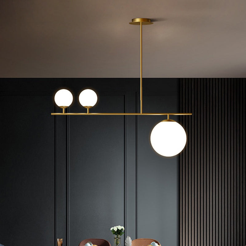 Brass Ball Pendant Light Minimalistic 3-Light Opal Glass Island Lighting for Dining Room Clearhalo 'Ceiling Lights' 'Island Lights' Lighting' 2464946