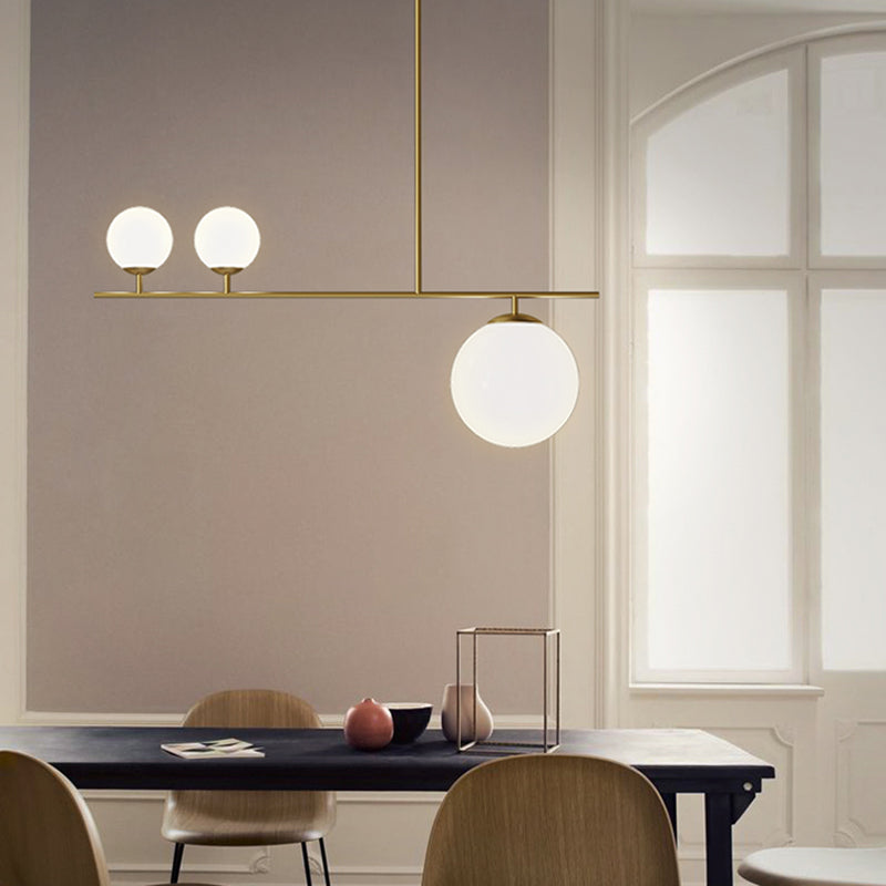 Brass Ball Pendant Light Minimalistic 3-Light Opal Glass Island Lighting for Dining Room Clearhalo 'Ceiling Lights' 'Island Lights' Lighting' 2464949