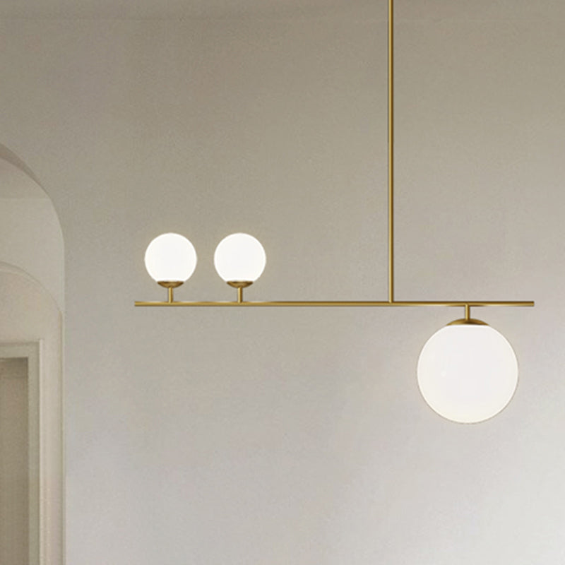 Brass Ball Pendant Light Minimalistic 3-Light Opal Glass Island Lighting for Dining Room Brass Clearhalo 'Ceiling Lights' 'Island Lights' Lighting' 2464950