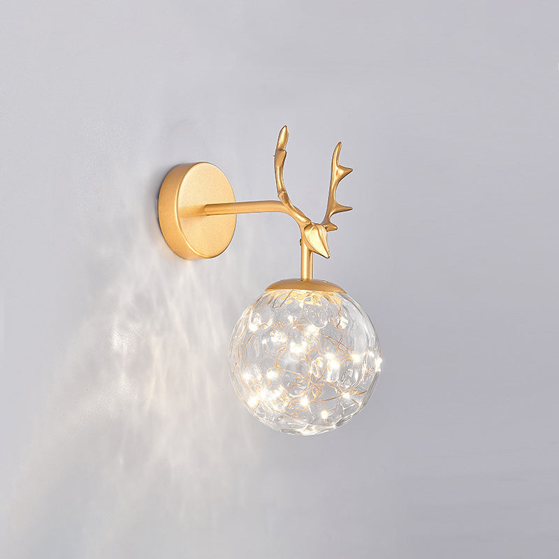 Antler and Ball Bedroom Sconce Light Glass LED Minimalist Wall Mount Lamp with Starry String Gold Prismatic Glass Clearhalo 'Cast Iron' 'Glass' 'Industrial' 'Modern wall lights' 'Modern' 'Tiffany' 'Traditional wall lights' 'Wall Lamps & Sconces' 'Wall Lights' Lighting' 2465456