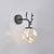 Antler and Ball Bedroom Sconce Light Glass LED Minimalist Wall Mount Lamp with Starry String Black Stained Glass Clearhalo 'Cast Iron' 'Glass' 'Industrial' 'Modern wall lights' 'Modern' 'Tiffany' 'Traditional wall lights' 'Wall Lamps & Sconces' 'Wall Lights' Lighting' 2465458
