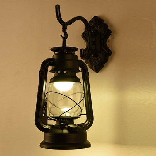 Single-Bulb Oil Lantern Sconce Antique Style Clear Glass Wall Mount Light Fixture for Aisle Black Curved Clearhalo 'Art deco wall lights' 'Cast Iron' 'Glass' 'Industrial wall lights' 'Industrial' 'Middle century wall lights' 'Modern' 'Rustic wall lights' 'Tiffany' 'Traditional wall lights' 'Wall Lamps & Sconces' 'Wall Lights' Lighting' 2465721