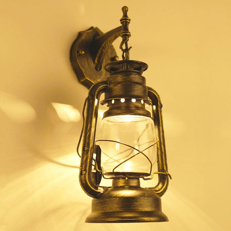 Single-Bulb Oil Lantern Sconce Antique Style Clear Glass Wall Mount Light Fixture for Aisle Clearhalo 'Art deco wall lights' 'Cast Iron' 'Glass' 'Industrial wall lights' 'Industrial' 'Middle century wall lights' 'Modern' 'Rustic wall lights' 'Tiffany' 'Traditional wall lights' 'Wall Lamps & Sconces' 'Wall Lights' Lighting' 2465722