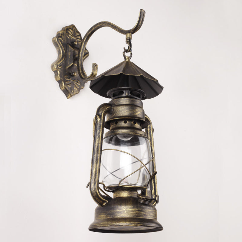 Single-Bulb Oil Lantern Sconce Antique Style Clear Glass Wall Mount Light Fixture for Aisle Bronze Umbrella Clearhalo 'Art deco wall lights' 'Cast Iron' 'Glass' 'Industrial wall lights' 'Industrial' 'Middle century wall lights' 'Modern' 'Rustic wall lights' 'Tiffany' 'Traditional wall lights' 'Wall Lamps & Sconces' 'Wall Lights' Lighting' 2465723
