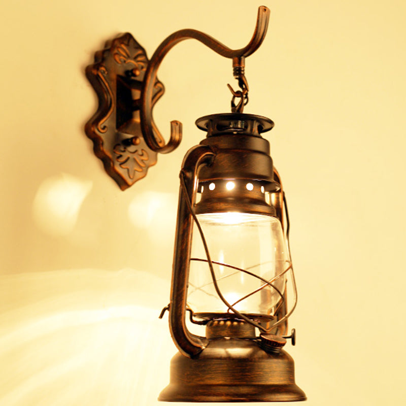Single-Bulb Oil Lantern Sconce Antique Style Clear Glass Wall Mount Light Fixture for Aisle Clearhalo 'Art deco wall lights' 'Cast Iron' 'Glass' 'Industrial wall lights' 'Industrial' 'Middle century wall lights' 'Modern' 'Rustic wall lights' 'Tiffany' 'Traditional wall lights' 'Wall Lamps & Sconces' 'Wall Lights' Lighting' 2465726