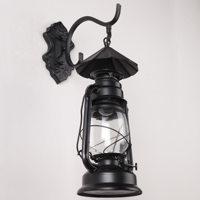 Single-Bulb Oil Lantern Sconce Antique Style Clear Glass Wall Mount Light Fixture for Aisle Black Umbrella Clearhalo 'Art deco wall lights' 'Cast Iron' 'Glass' 'Industrial wall lights' 'Industrial' 'Middle century wall lights' 'Modern' 'Rustic wall lights' 'Tiffany' 'Traditional wall lights' 'Wall Lamps & Sconces' 'Wall Lights' Lighting' 2465727