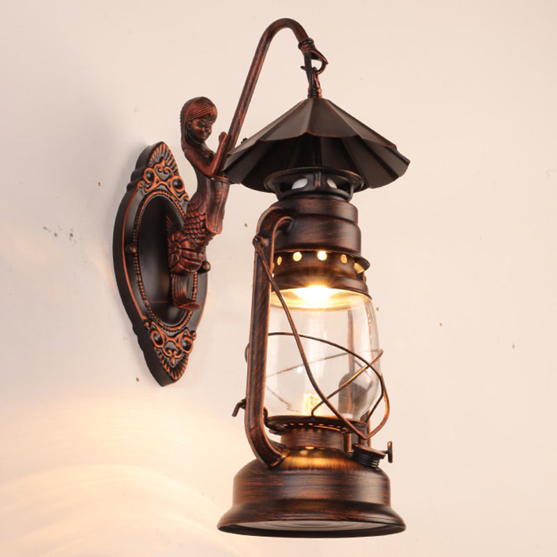 Single-Bulb Oil Lantern Sconce Antique Style Clear Glass Wall Mount Light Fixture for Aisle Copper Mermaid Clearhalo 'Art deco wall lights' 'Cast Iron' 'Glass' 'Industrial wall lights' 'Industrial' 'Middle century wall lights' 'Modern' 'Rustic wall lights' 'Tiffany' 'Traditional wall lights' 'Wall Lamps & Sconces' 'Wall Lights' Lighting' 2465732