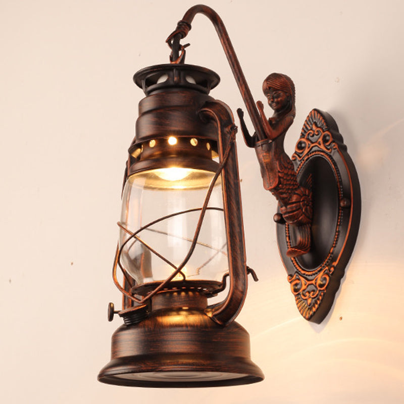 Single-Bulb Oil Lantern Sconce Antique Style Clear Glass Wall Mount Light Fixture for Aisle Copper Arc Clearhalo 'Art deco wall lights' 'Cast Iron' 'Glass' 'Industrial wall lights' 'Industrial' 'Middle century wall lights' 'Modern' 'Rustic wall lights' 'Tiffany' 'Traditional wall lights' 'Wall Lamps & Sconces' 'Wall Lights' Lighting' 2465735