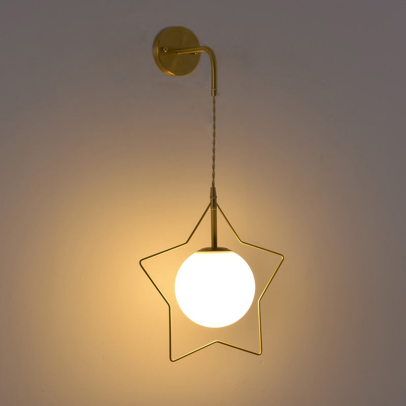 Brass Star Wall Hanging Lamp Nordic Metal Single Bedroom Wall Light with Ball Glass Shade Clearhalo 'Art deco wall lights' 'Cast Iron' 'Glass' 'Industrial wall lights' 'Industrial' 'Middle century wall lights' 'Modern' 'Rustic wall lights' 'Tiffany' 'Traditional wall lights' 'Wall Lamps & Sconces' 'Wall Lights' Lighting' 2466138