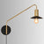 Metal Swing Arm Sconce Lamp Industrial Style Single Living Room Reading Light with Saucer Lampshade Gold-Black Plug In Clearhalo 'Art deco wall lights' 'Cast Iron' 'Glass' 'Industrial wall lights' 'Industrial' 'Middle century wall lights' 'Modern' 'Rustic wall lights' 'Tiffany' 'Traditional wall lights' 'Wall Lamps & Sconces' 'Wall Lights' Lighting' 2466446