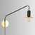 Metal Swing Arm Sconce Lamp Industrial Style Single Living Room Reading Light with Saucer Lampshade Black Plug In Clearhalo 'Art deco wall lights' 'Cast Iron' 'Glass' 'Industrial wall lights' 'Industrial' 'Middle century wall lights' 'Modern' 'Rustic wall lights' 'Tiffany' 'Traditional wall lights' 'Wall Lamps & Sconces' 'Wall Lights' Lighting' 2466450