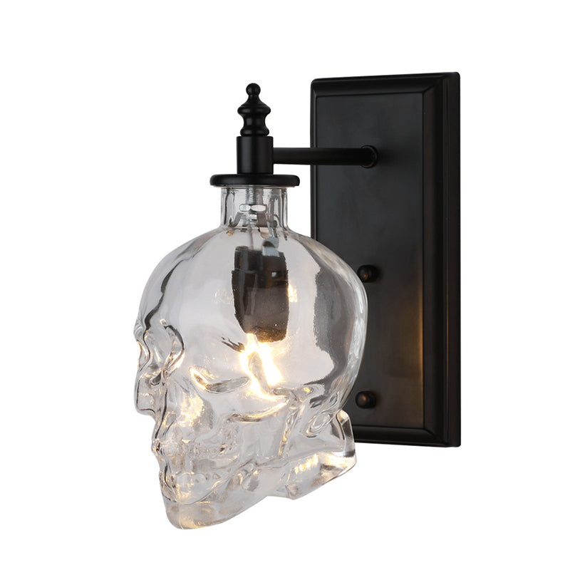 Clear Glass Skull Wall Lighting Art Deco 1 Head Black Sconce Light Fixture for Bedroom Clearhalo 'Art deco wall lights' 'Cast Iron' 'Glass' 'Industrial wall lights' 'Industrial' 'Middle century wall lights' 'Modern' 'Rustic wall lights' 'Tiffany' 'Traditional wall lights' 'Wall Lamps & Sconces' 'Wall Lights' Lighting' 2466495