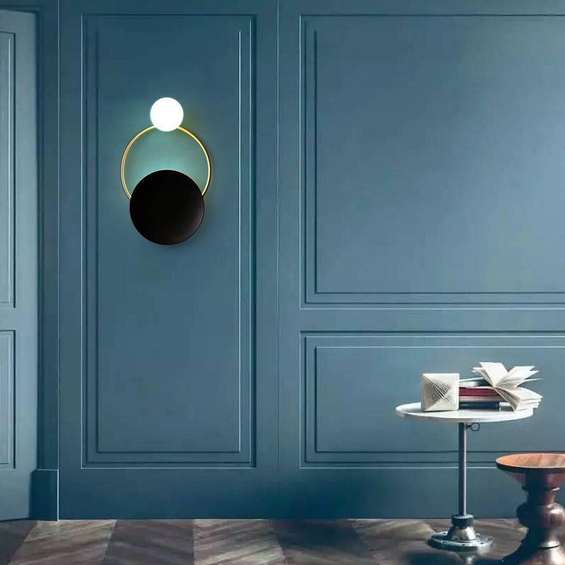 Postmodern Creative Circle Wall Sconce Cream Glass 1 Head Corridor Wall Light in Black-Brass Clearhalo 'Cast Iron' 'Glass' 'Industrial' 'Modern wall lights' 'Modern' 'Tiffany' 'Traditional wall lights' 'Wall Lamps & Sconces' 'Wall Lights' Lighting' 2466925